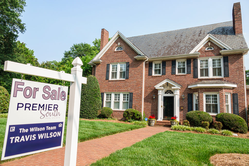 Belmont, North Carolina, Myers Park, large brick mansion with for sale sign in front yard