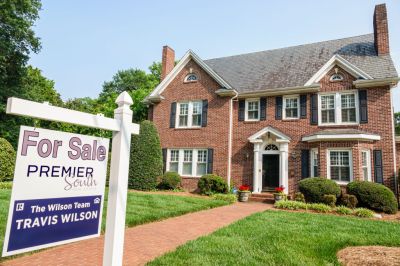 Belmont, North Carolina, Myers Park, large brick mansion with for sale sign in front yard