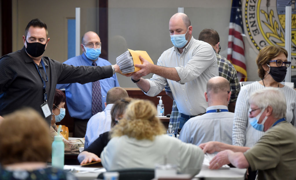 Luzerne County employees open mail-in ballots to be counted