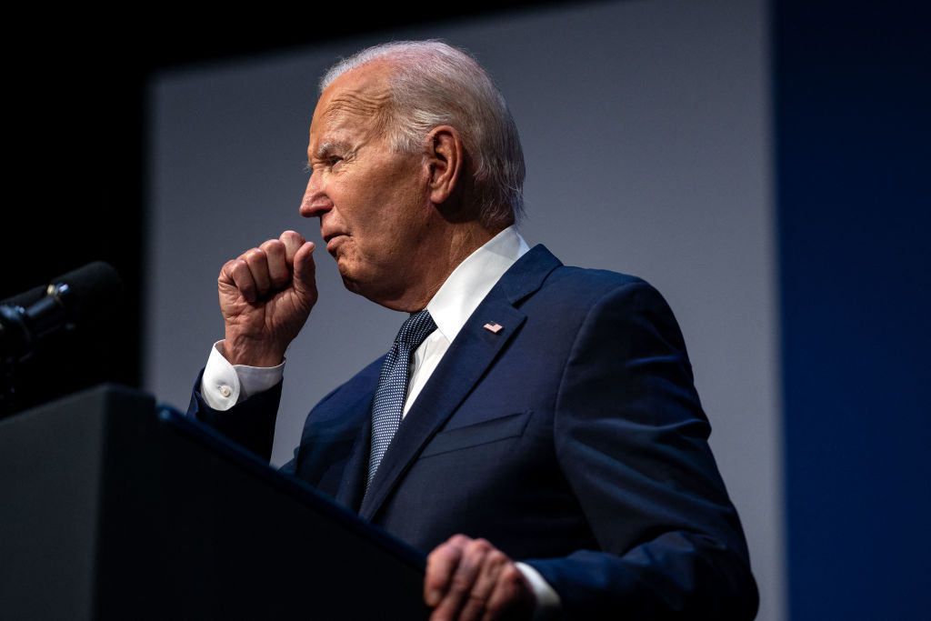 President Joe Biden clears his throat as he speaks during the Vote To Live Prosperity Summit at the College of Southern Nevada in Las Vegas on July 16, 2024. (Photo by KENT NISHIMURA/AFP via Getty Images)