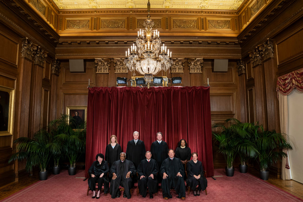 Members of the Supreme Court sit for a group photo following the addition of Associate Justice Ketanji Brown Jackson at the Supreme Court building on Capitol Hill on October 7, 2022, in Washington, D.C. (Photo by Jabin Botsford/The Washington Post via Getty Images)