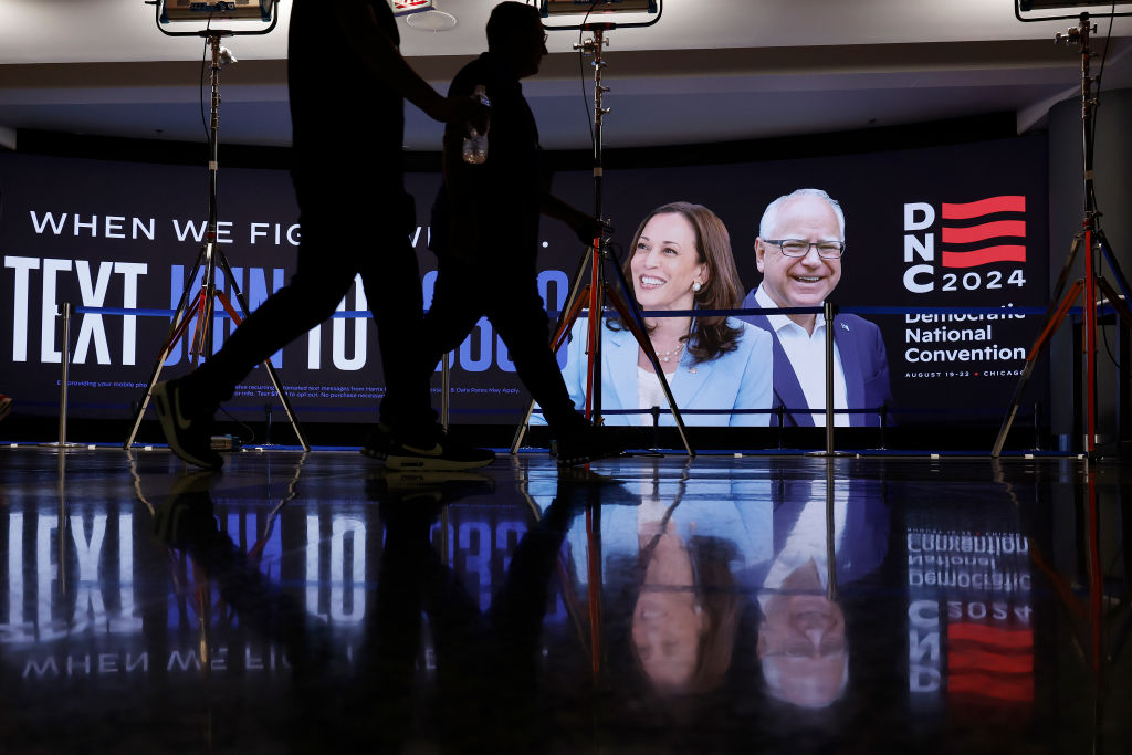 Images of Vice President Kamala Harris and vice presidential candidate Gov. Tim Walz are shown on a video wall inside the United Center ahead of the Democratic National Convention on August 17, 2024 in Chicago, Illinois. (Photo by Chip Somodevilla/Getty Images)