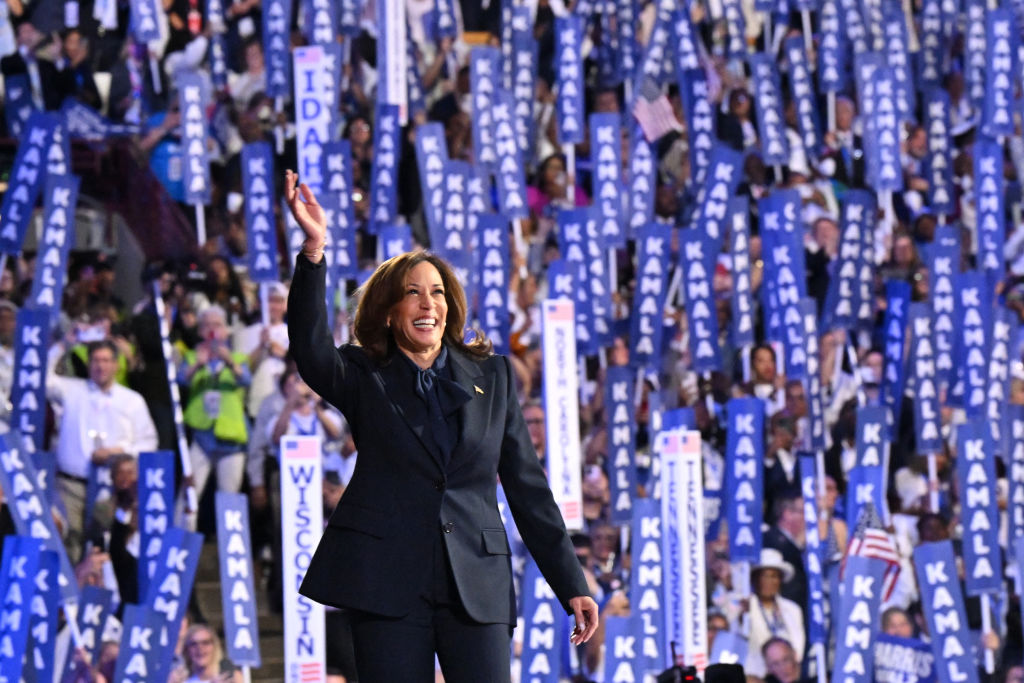 Vice President Kamala Harris waves as she arrives to speak on the fourth and last day of the Democratic National Convention at the United Center in Chicago on August 22, 2024. (Photo by ROBYN BECK/AFP via Getty Images)