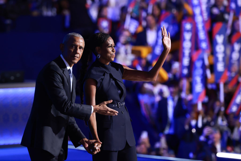 Former President Barack Obama and former First Lady Michelle Obama during the second day of the Democratic National Convention on August 20, 2024, in Chicago, Illinois. (Photo by Joe Raedle/Getty Images)