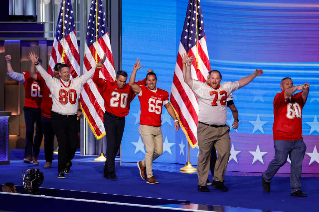 Former members of the Mankato West High School football team take the stage during the third day of the Democratic National Convention at the United Center on August 21, 2024, in Chicago. (Photo by Chip Somodevilla/Getty Images)