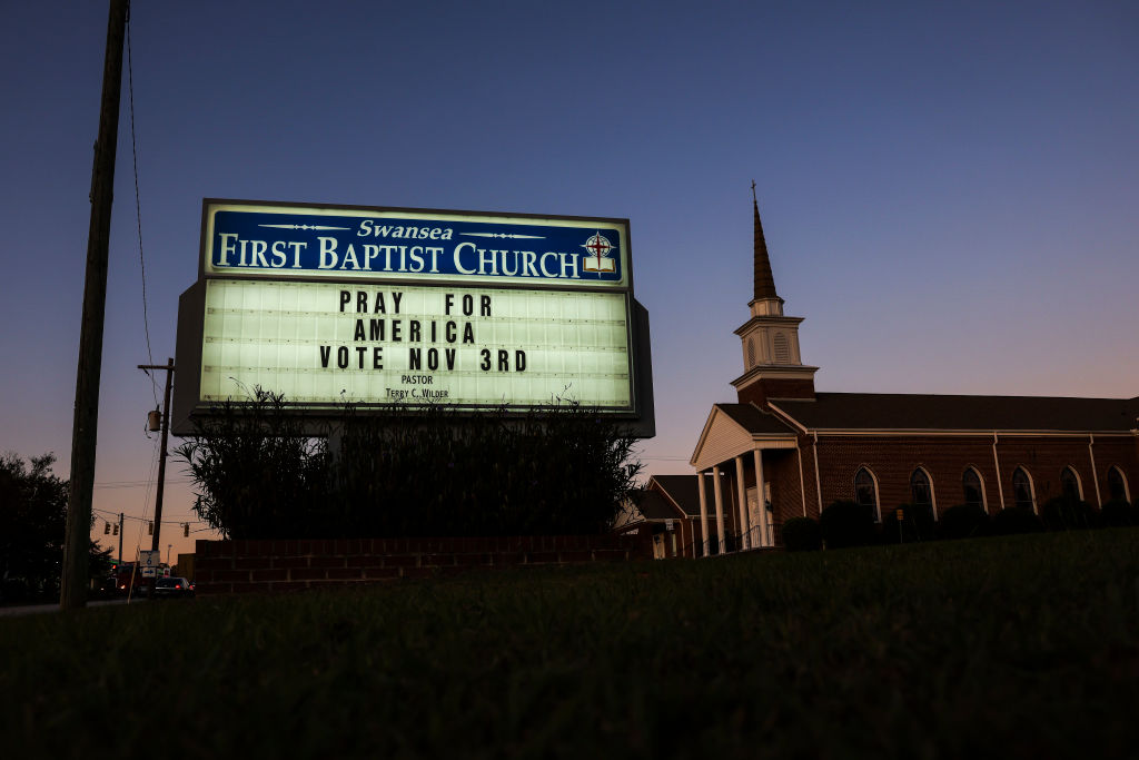 A sign encourages people to pray and vote, seen on Election Day on November 3, 2020, in Swansea, South Carolina. (Photo by Michael Ciaglo/Getty Images)