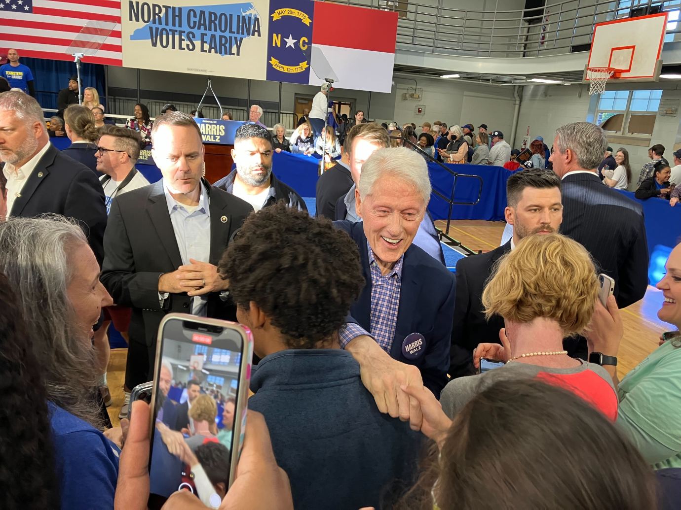 Former President Bill Clinton greets attendees at a campaign appearance with Minnesota Gov. Tim Walz in Durham, North Carolina, on October 17, 2024. (Photo by Michael Warren)