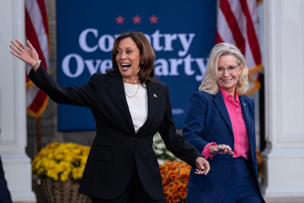 Vice President Kamala Harris walks out with former Rep. Liz Cheney during a rally at Ripon College on October 3, 2024, in Ripon, Wisconsin. (Photo by Jim Vondruska/Getty Images)