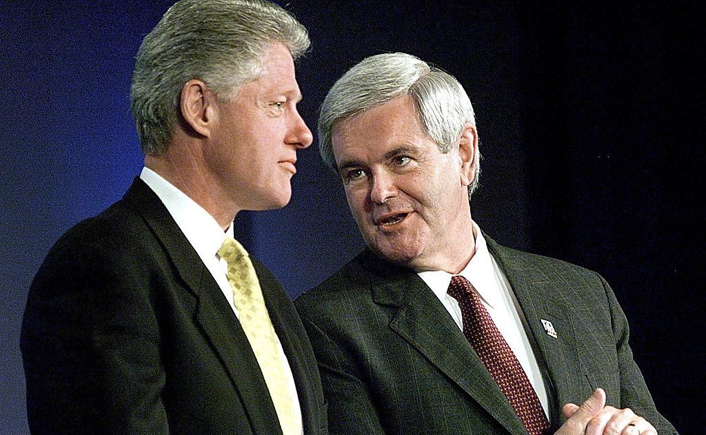 US President Bill Clinton (L) and Speaker of the H