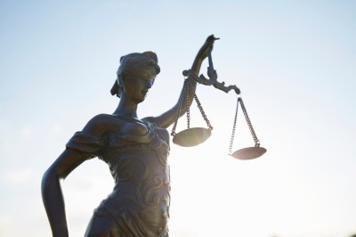 Lady Justice against clear sky