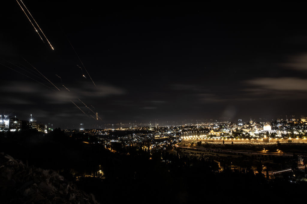 Rockets, fired from Iran, are seen over Jerusalem on October 1, 2024. The Israeli army announced that missiles were fired from Iran toward Israel and sirens were heard across the country, especially in Tel Aviv. (Photo by Mostafa Alkharouf/Anadolu via Getty Images)