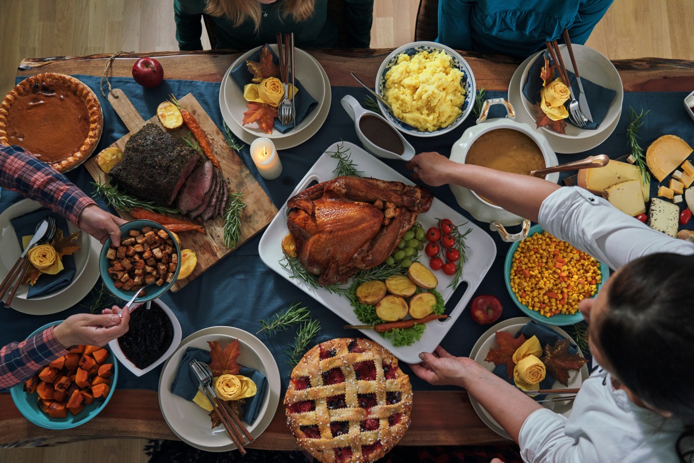 Stuffed Turkey for Thanksgiving Holidays with Pumpkin, Peas, Pecan, Berry Pie, and Other Ingredients