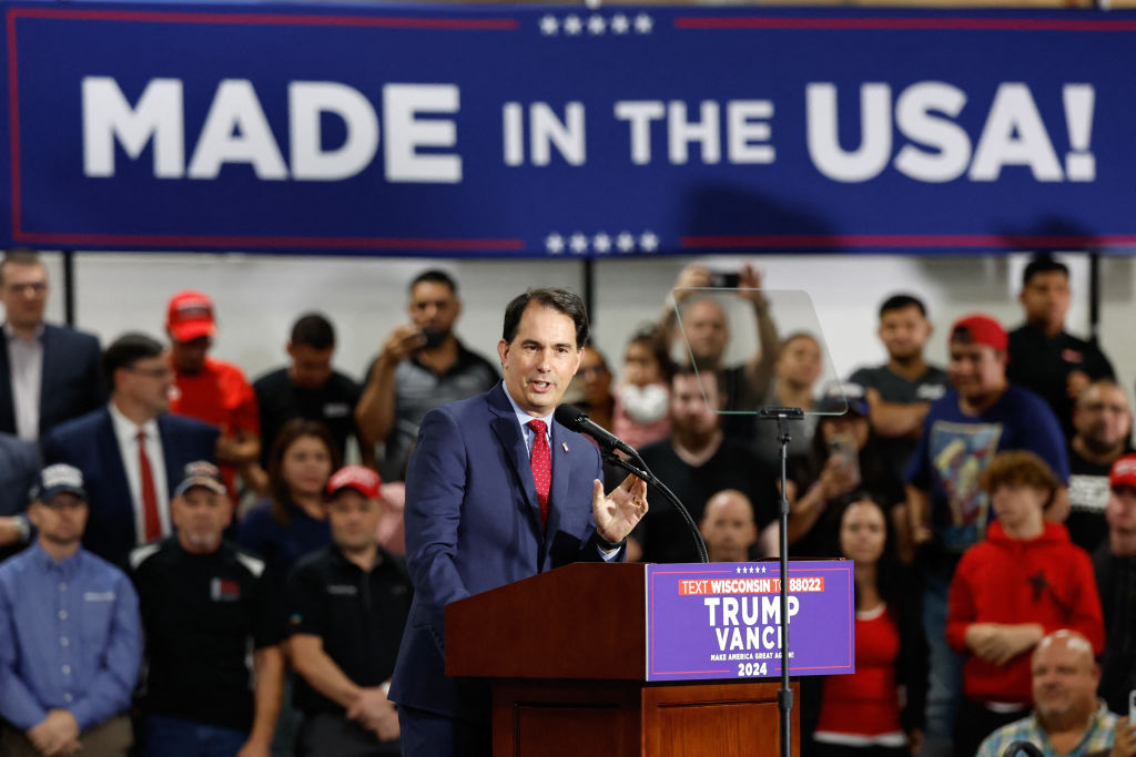 Former Wisconsin Gov. Scott Walker speaks during a campaign rally for former President Donald Trump at Dane Manufacturing in Waunakee, Wisconsin, October 1, 2024. (Photo by KAMIL KRZACZYNSKI/AFP via Getty Images)