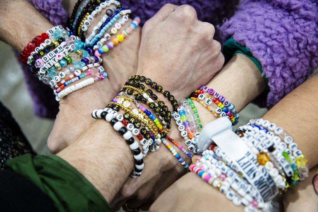 Taylor Swift fans in Toronto, Ontario, show off their Eras tour bracelets. (Nick Lachance/Toronto Star via Getty Images)