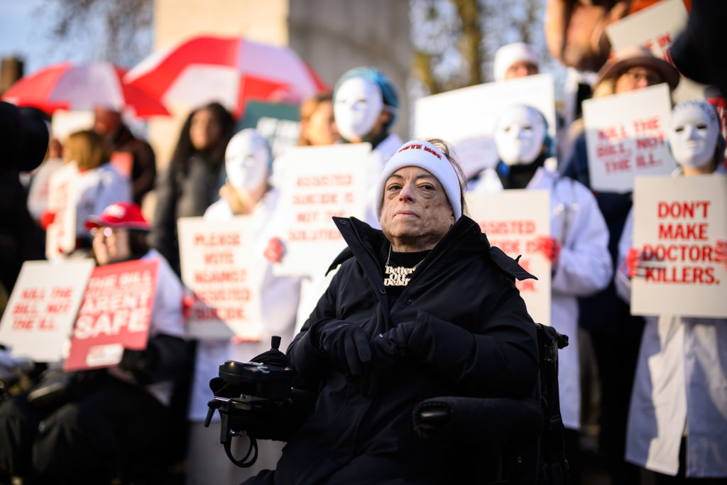 Campaigner and actress Liz Carr of the "Not Dead Yet" campaign, which opposes the Assisted Dying Bill, joins a protest outside the Houses of Parliament on November 29, 2024 in London. (Photo by Leon Neal/Getty Images)