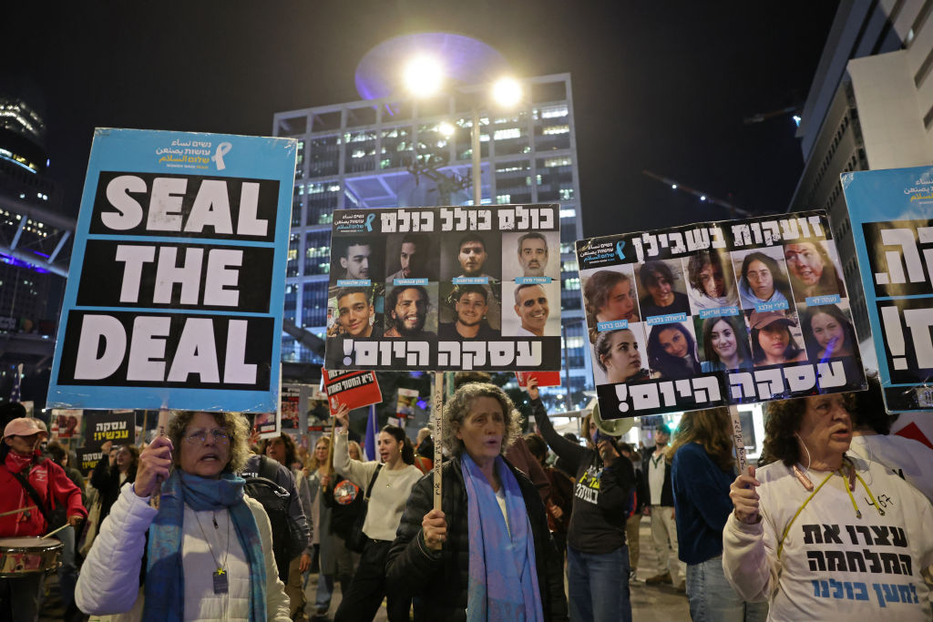 Demonstrators in Tel Aviv call for the release of Israeli hostages on January 16, 2025. (Photo by JACK GUEZ/AFP via Getty Images)