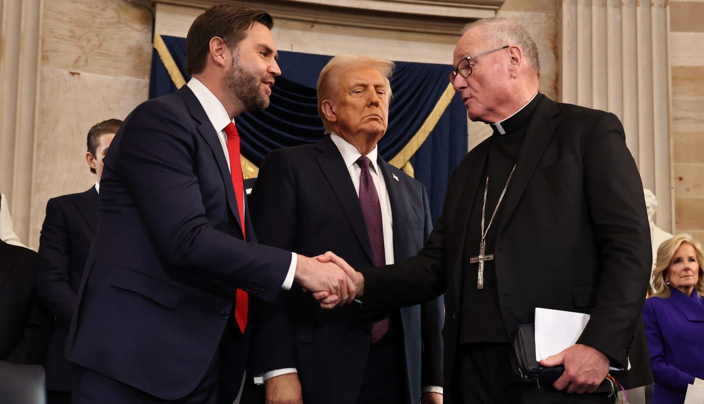 Vice President J.D. Vance and President Donald Trump greet Cardinal Timothy M. Dolan after he delivered the invocation during inauguration ceremonies in the Rotunda of the U.S. Capitol on January 20, 2025. (Photo by Chip Somodevilla/Getty Images)