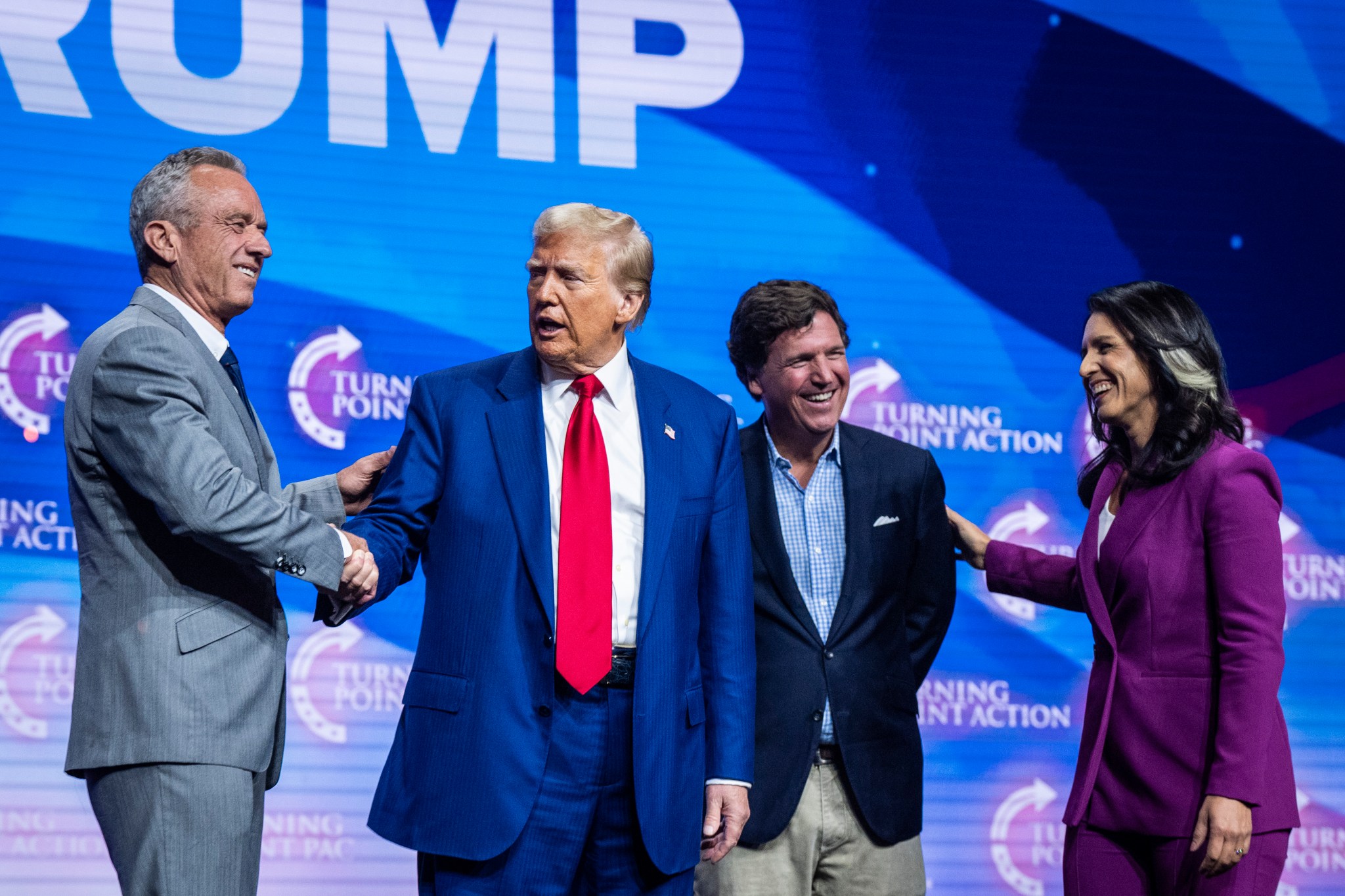 Robert F. Kennedy Jr., Donald Trump, Tucker Carlson, and Tulsi Gabbard speak at a Turning Point Action Rally in Duluth, Georgia, on Wednesday, October 23, 2024. (Photo by Jabin Botsford/The Washington Post via Getty Images)