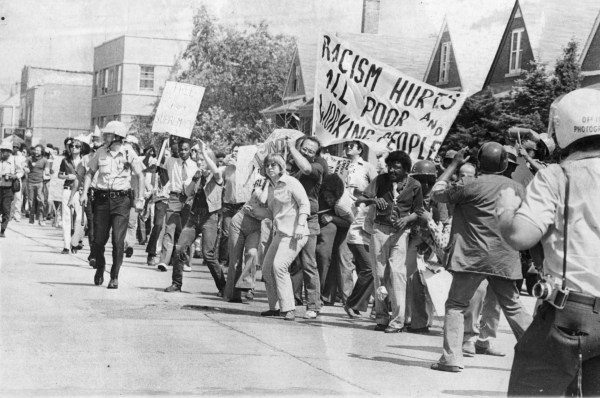 Demonstrators line the streets as they protest a potential neo-Nazi march in Skokie, Illinois, in 1977 or 1978. (Photo by The Abbott Sengstacke Family Papers/Robert Abbott Sengstacke/Getty Images)