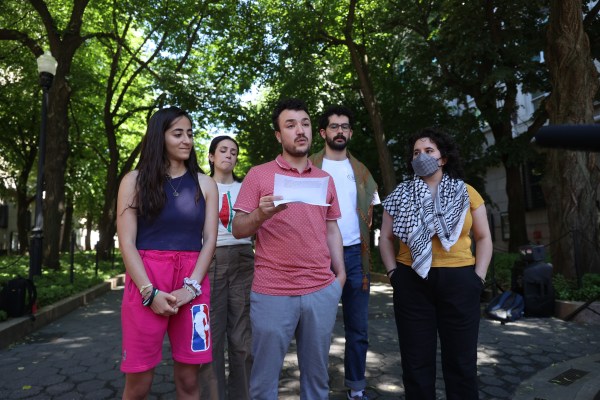 Columbia University student Mahmoud Khalil (center) talks to the media during the press briefing organized by pro-Palestinian protesters who set up a new encampment at Columbia University's Morningside Heights campus in New York City on June 1, 2024. (Photo by Selcuk Acar/Anadolu via Getty Images)