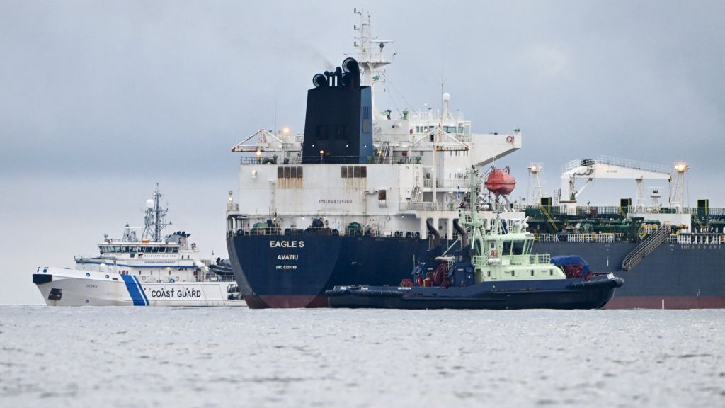 Russian-linked oil tanker Eagle S next to Finnish border guard ship Uisko. (Photo by Jussi Nukari/Lehtikuva/AFP via Getty Images)