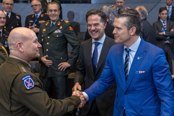 U.S. Defense Secretary Pete Hegseth greets Supreme Allied Commander Europe Gen. Christopher Cavoli as NATO Secretary General Mark Rutte looks on before the start of the North Atlantic Council meeting of Defense Ministers at NATO Headquarters in Brussels, Belgium,  on February 13, 2025. (Photo by Omar Havana/Getty Images)