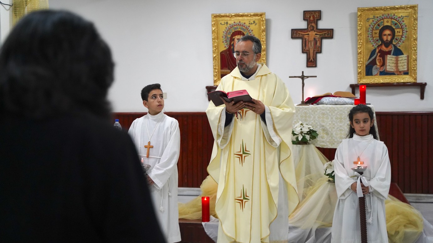 Father Tony Homsy celebrates a Catholic Mass in the Alawite district of Ikrima in Homs, Syria, on January 11, 2025. (Dispatch photo by Iryna Matviyishyn)