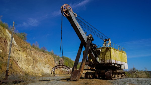 An old excavator sits idle. (Photograph by Iryna Matviyishyn)