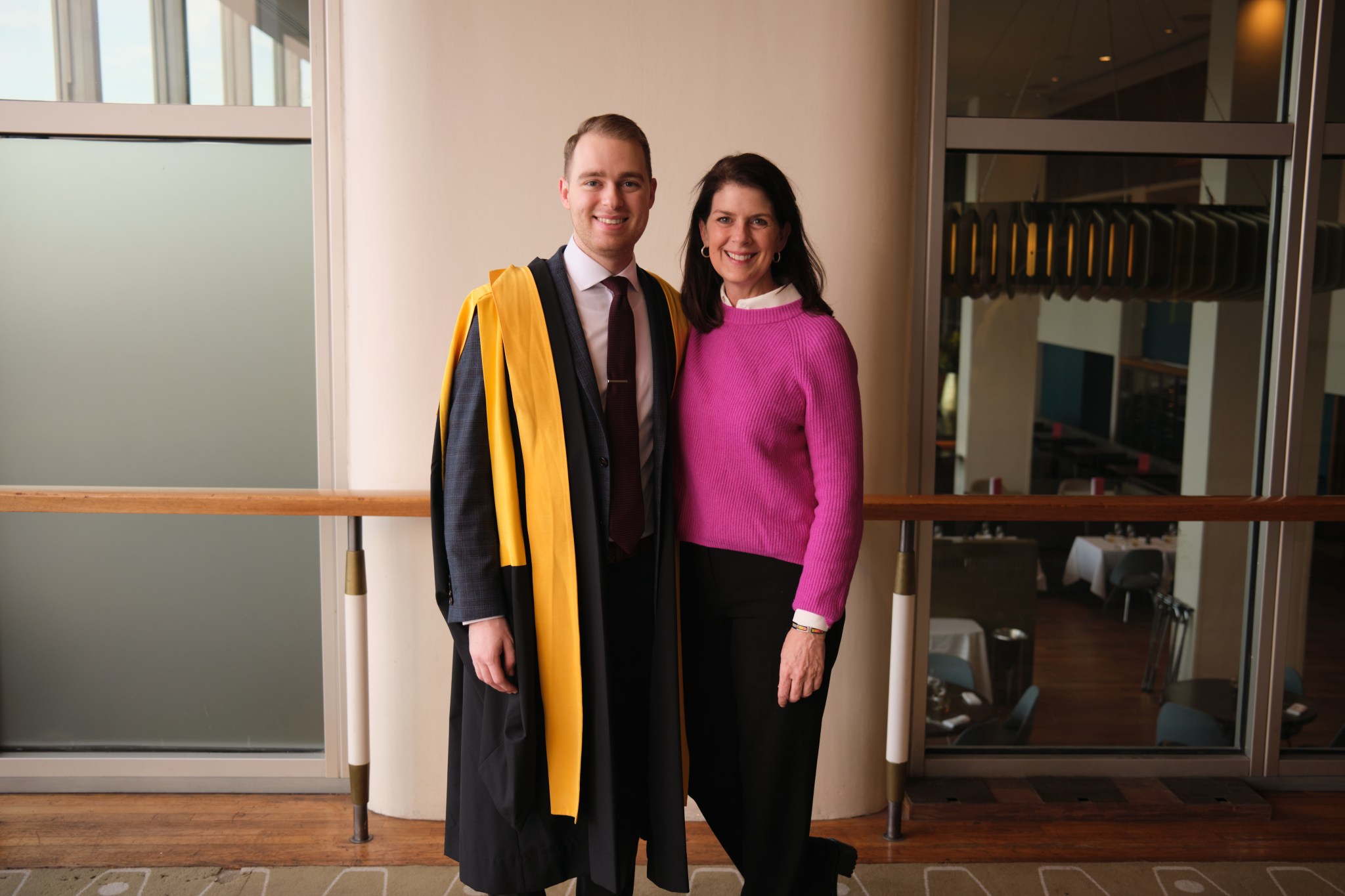 The author and his mother at his graduation in January 2023. (Photo by Alex Demas)