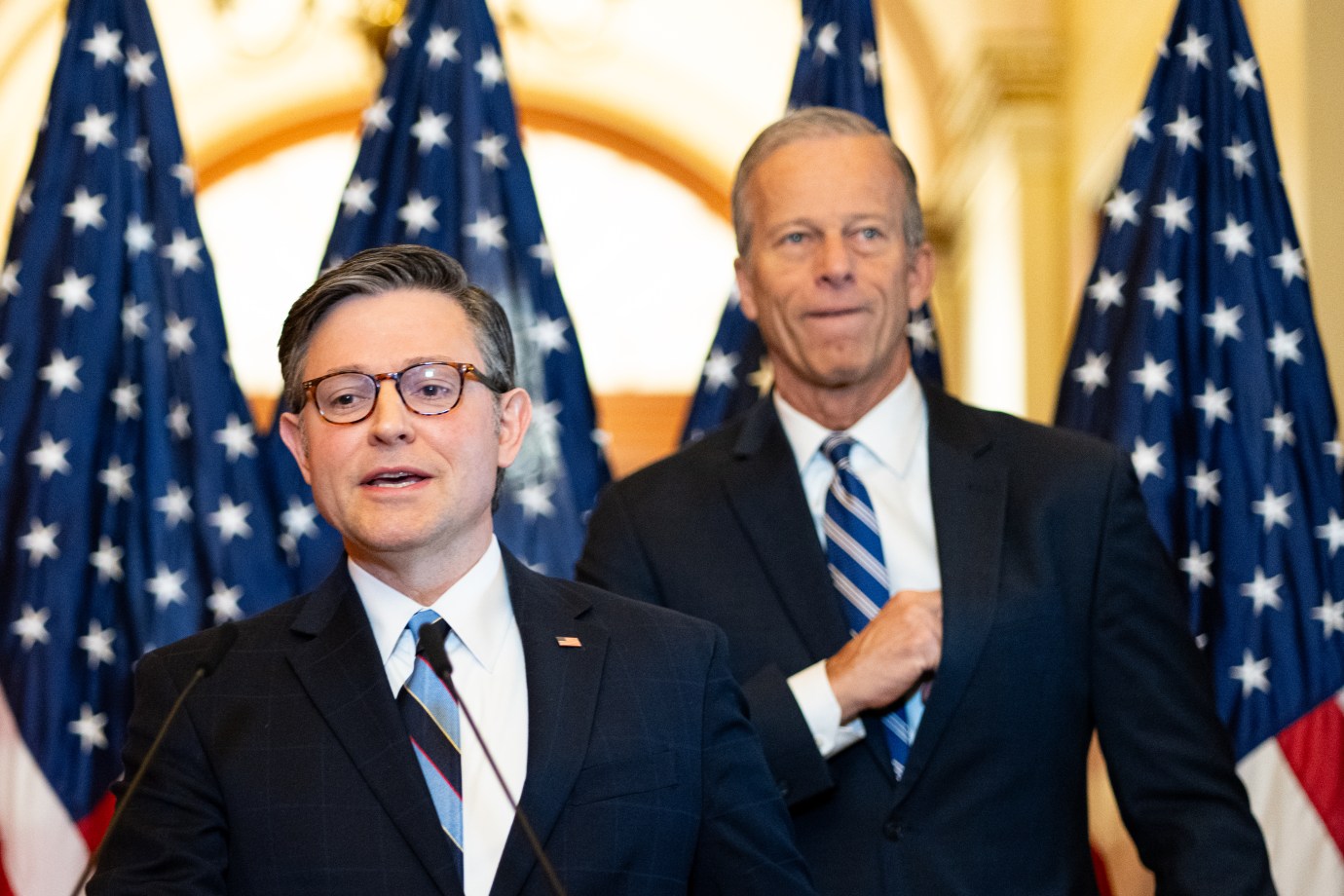 Speaker of the House Mike Johnson, left, and Senate Majority Leader John Thune hold a news conference on passing the budget resolution in the Capitol on Thursday, April 10, 2025. (Bill Clark/CQ-Roll Call/Getty Images)