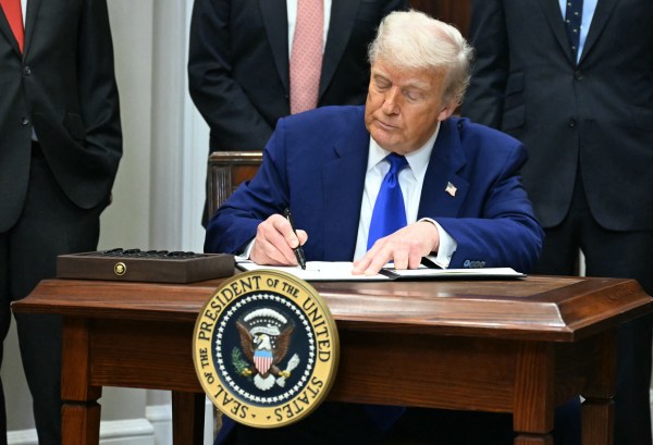 President Donald Trump signs an executive order on prescription drug prices in the Roosevelt Room of the White House on May 12, 2025, in Washington, D.C. (Photo by Jim Watson/AFPGetty Images)