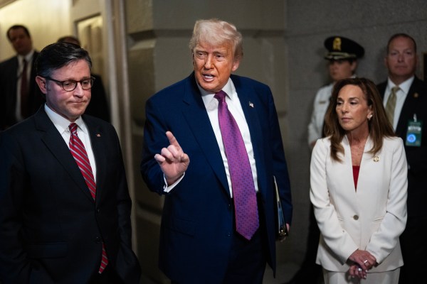 President Donald Trump, House Speaker Mike Johnson, and House Republican Conference Chair Lisa McClain talk with reporters before a House Republican Conference meeting on the budget reconciliation bill in the Capitol on May 20, 2025. (Tom Williams/CQ-Roll Call, Inc via Getty Images)