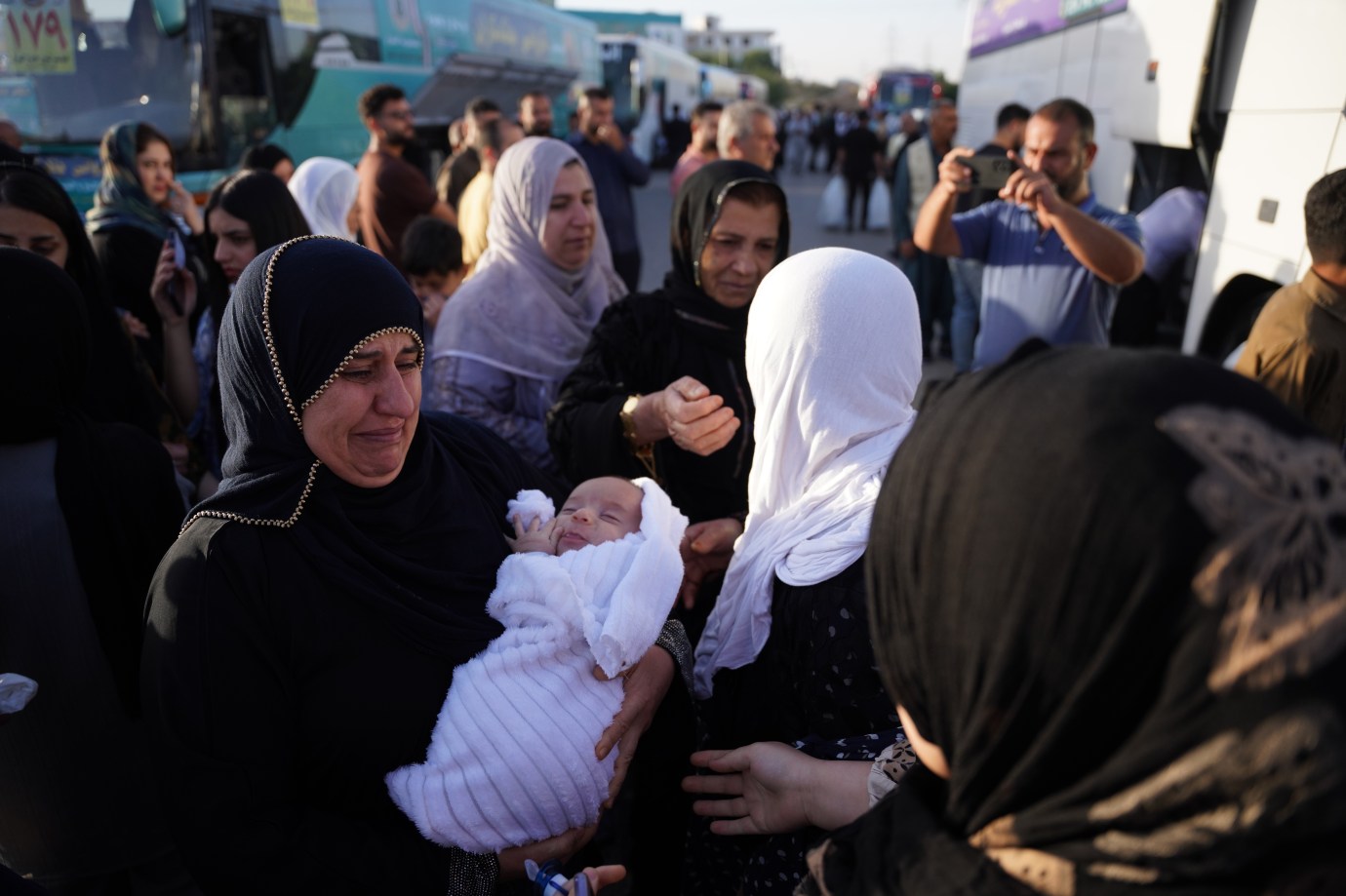 Iraqi pilgrims depart from the city of Sulaymaniyah as the first Hajj convoy is sent off to the holy lands in Saudi Arabia with prayers on May 16. Family members and local officials gathered to bid farewell to the 360 pilgrims in a large send-off ceremony. The Hajj, one of the five pillars of Islam, is the pilgrimage Muslims make to Mecca, located in Saudi Arabia. Millions will make the trek and take part in ceremonies between June 4 and 9. (Photo by Fariq Faraj Mahmood/Anadolu via Getty Images)