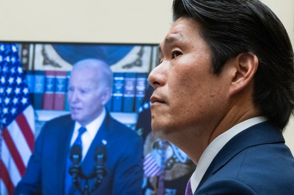 Special Counsel Robert K. Hur watches a video of President Joe Biden during the House Judiciary Committee hearing about his report on Biden's retention of classified materials as a private citizen, on Tuesday, March 12, 2024. (Photo by Tom Williams/CQ-Roll Call, Inc via Getty Images)