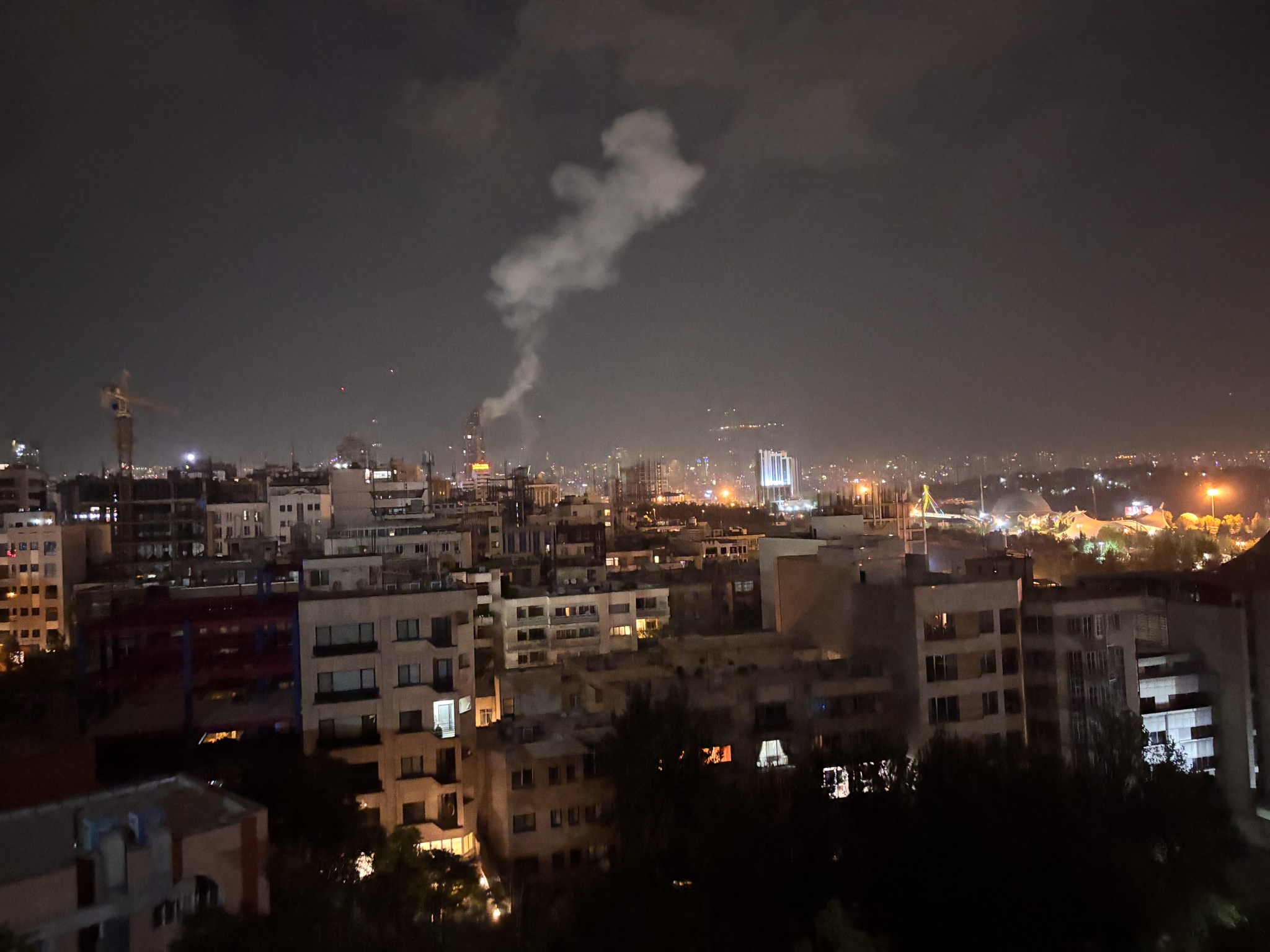 Smoke rises from a location targeted in Israel's wave of strikes on Tehran, Iran, on June 13, 2025. (Photo by SAN/Middle East Images/AFP via Getty Images)