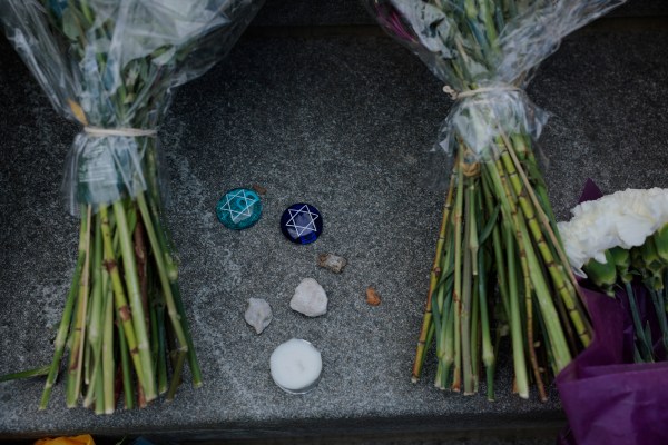 Handwritten notes, flowers, and stones are left outside the Lillian and Albert Small Capital Jewish Museum on May 23, 2025 in Washington, D.C. (Photo by Anna Moneymaker/Getty Images)