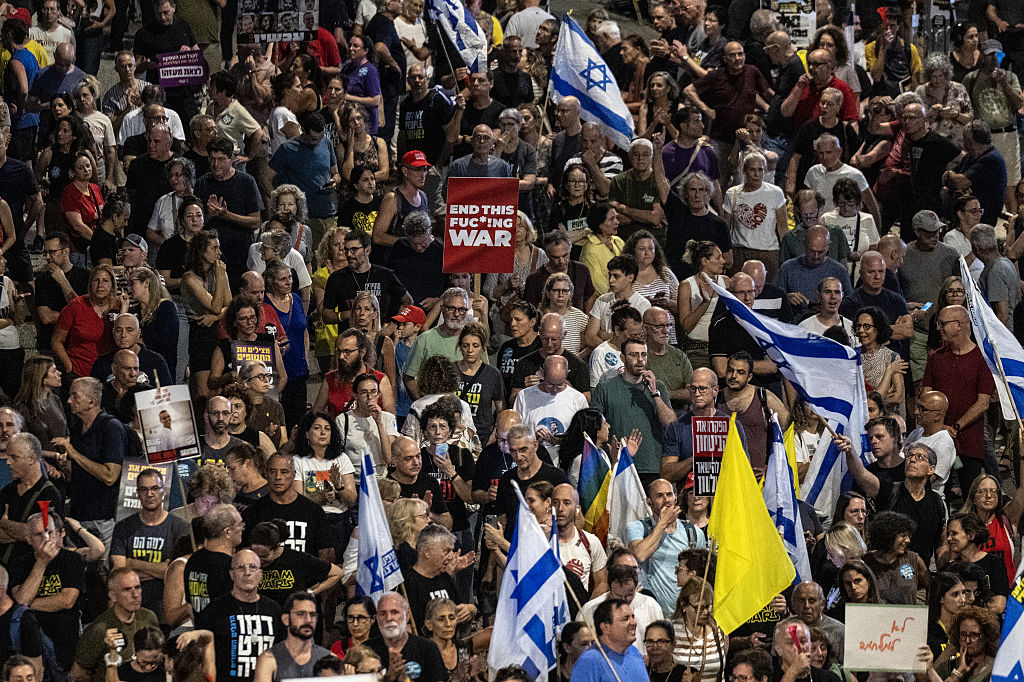 Protesters gather in Tel Aviv on June 28, 2025, demanding a ceasefire in Gaza and the return of Israeli hostages. (Photo by Mostafa Alkharouf/Anadolu via Getty Images)