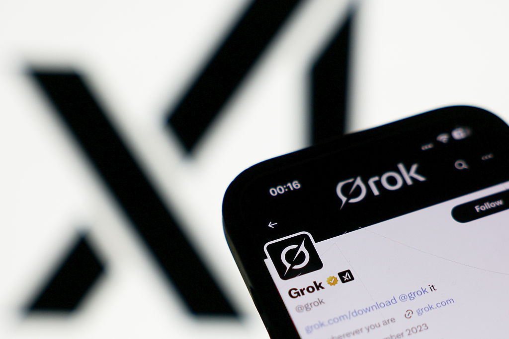 Grok account on X displayed on a phone screen. (Photo by Jakub Porzycki/NurPhoto via Getty Images)