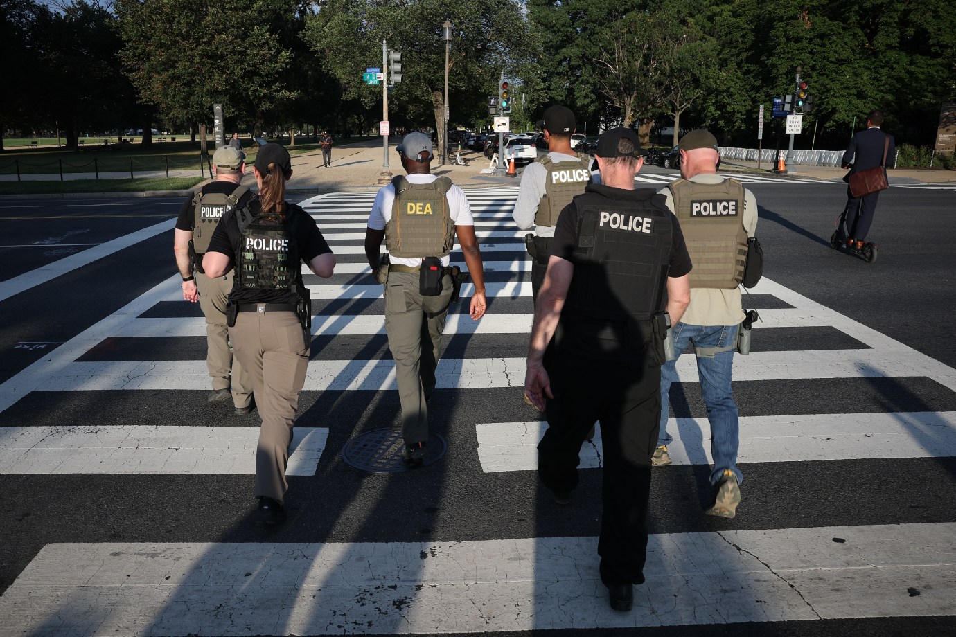 Members of the Drug Enforcement Administration (DEA) patrol the National Mall on August 12, 2025, in Washington, D.C.  (Photo by Win McNamee/Getty Images)