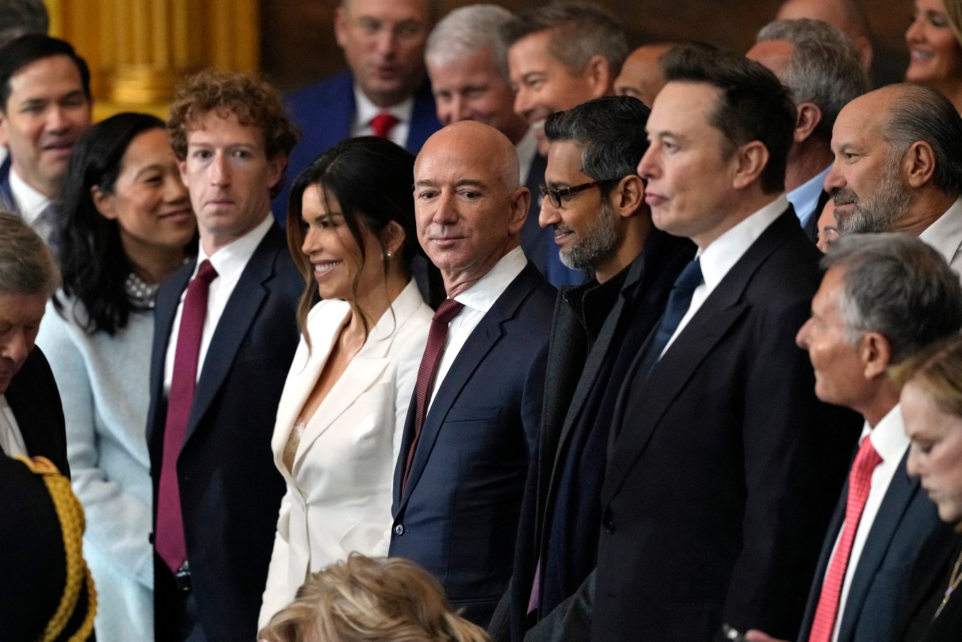 Mark Zuckerberg, Lauren Sanchez, Jeff Bezos, Sundar Pichai, and  Elon Musk attend the inauguration ceremony of Donald Trump on January 20, 2025. (Photo by Julia Demaree Nikhinson/POOL/AFP via Getty Images)