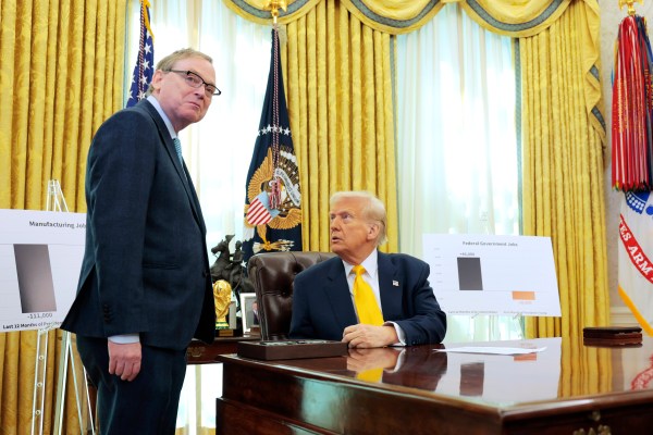 President Donald Trump speaks with Kevin Hassett, director of the National Economic Council, in the Oval Office at the White House on March 7, 2025. (Photo by Anna Moneymaker/Getty Images)