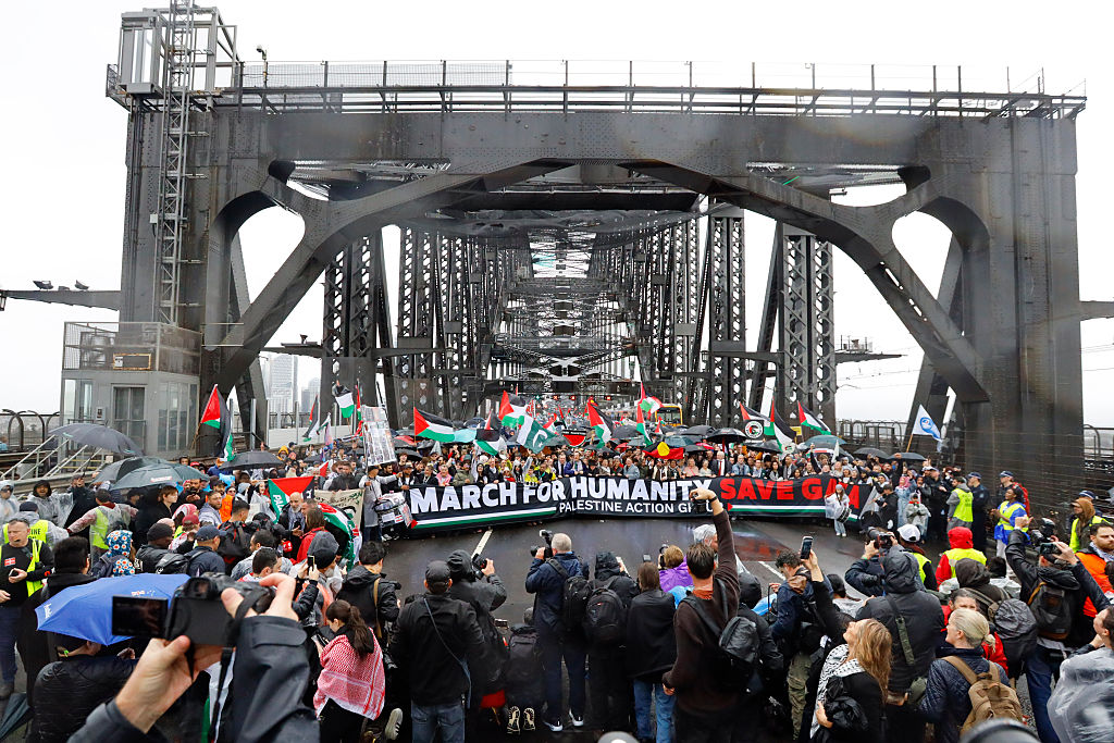 Anti-Israel protesters march across the Sydney Harbor Bridge on August 3, 2025. (Photo by Ye Myo Khant/SOPA Images/LightRocket via Getty Images)