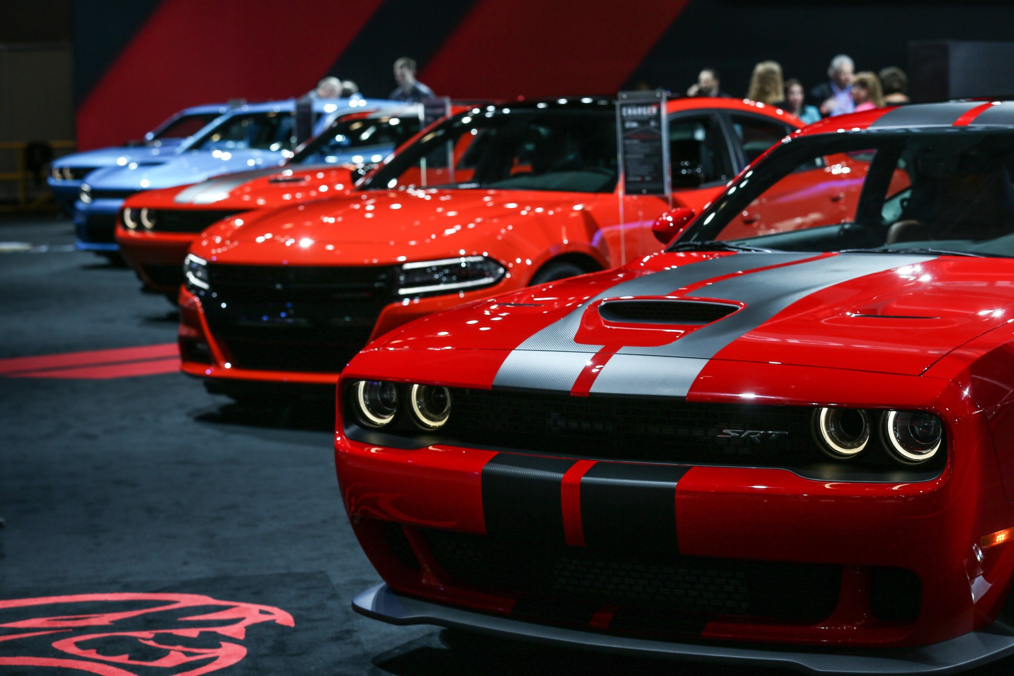 A Dodge Challenger and a Dodge Charger on display during the 116th New York International Auto Show at the Javits Convention Center in Manhattan on March 24, 2016. (Photo by Cem Ozdel/Anadolu Agency/Getty Images)