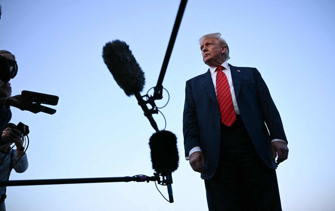President Donald Trump speaks to journalists at Lehigh Valley International Airport in Allentown, Pennsylvania. (Photo by Brendan Smialowski/AFP via Getty Images)
